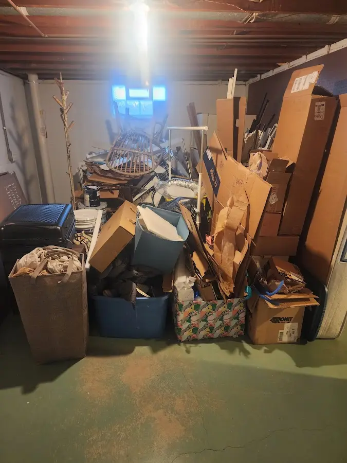 Roll-off dumpster container at job site for Roll Off Dumpster Rental in Harris